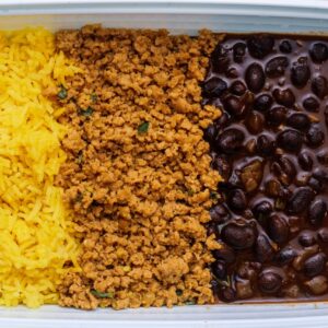 Organic ground turkey, yellow turmeric rice, and black beans