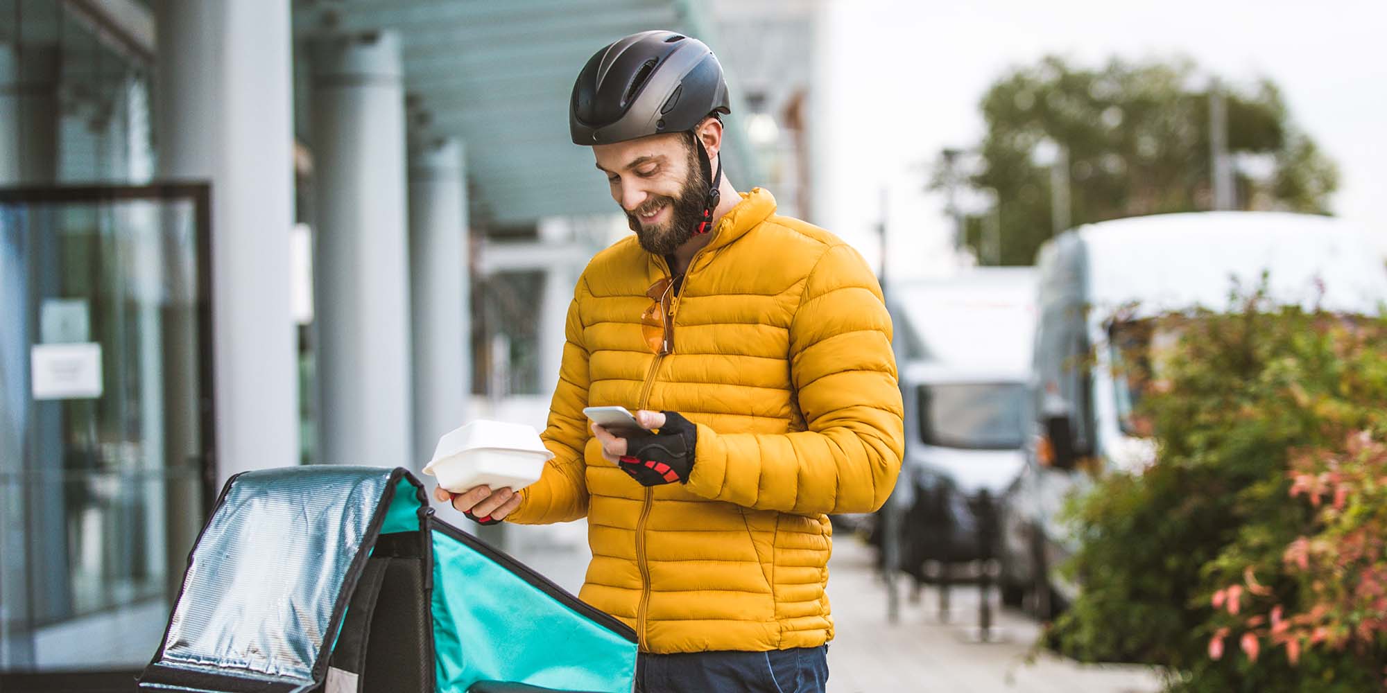 food-delivery-rider-with-bicycle-delivering-food-FDFP8XM.jpg