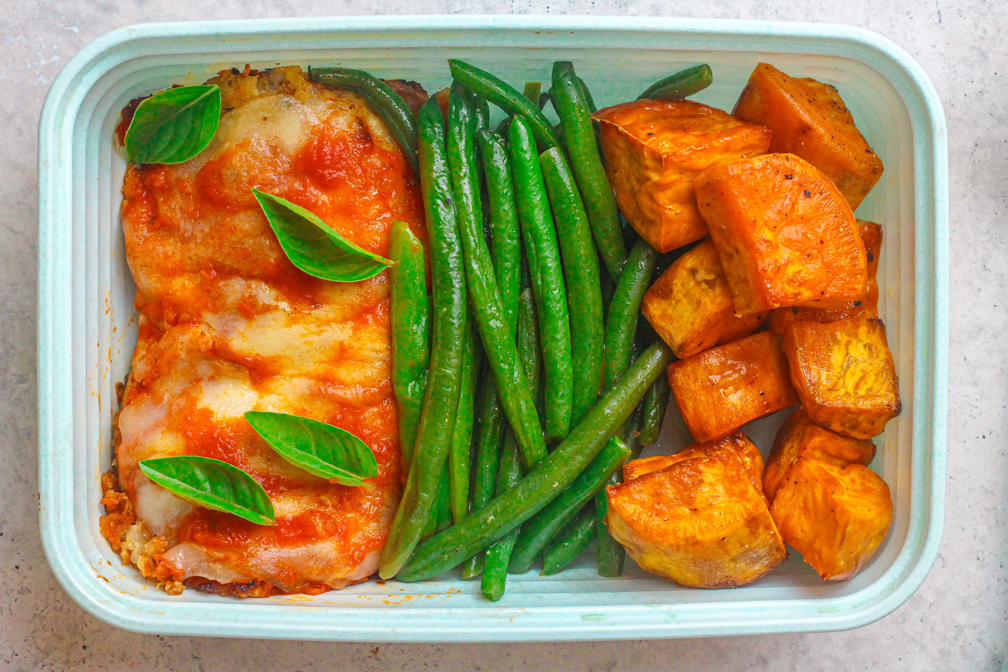 Chicken parmesan, fresh greens beans and roasted sweet potatoes